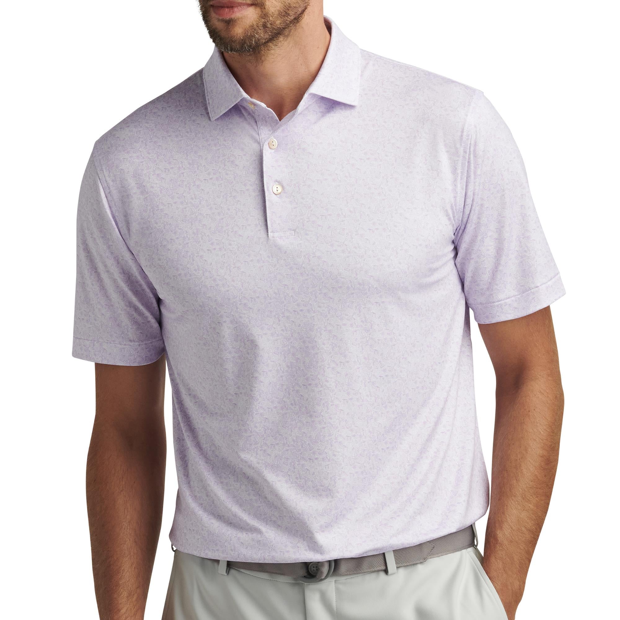 Male model wearing Peter Millar Getaway Performance Jersey Polo in White – mens golf polo shirt UK